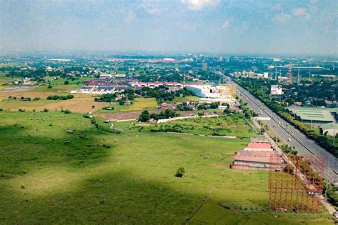 Megaworld to build P98 billion development in Bulacan .